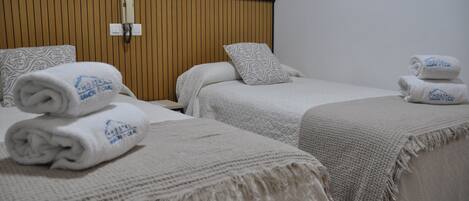 Down duvets, Select Comfort beds, desk, laptop workspace