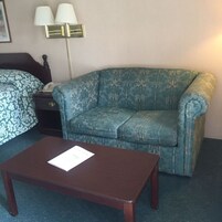 Traditional Room, 1 King Bed, Refrigerator & Microwave | Living area | Flat-screen TV