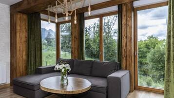 Comfort Apartment, Balcony, Mountain View | Living area | Flat-screen TV