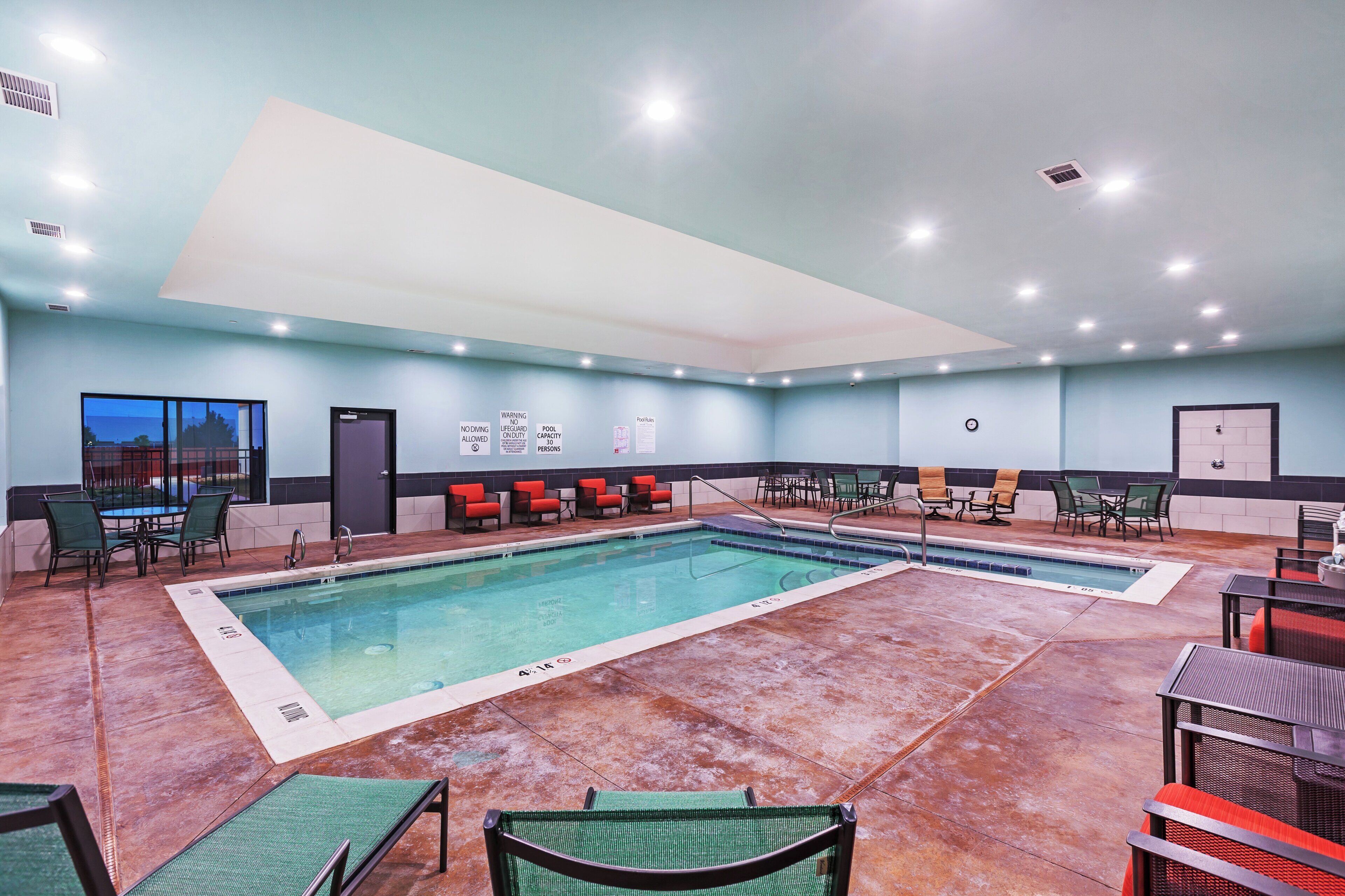 Indoor pool, open 7 AM to 10 PM, sun loungers