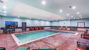 Indoor pool, open 7 AM to 10 PM, sun loungers