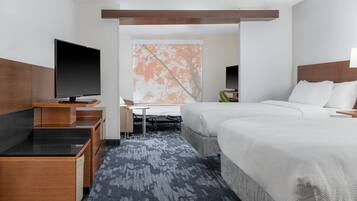 Desk, blackout curtains, iron/ironing board, travel cot