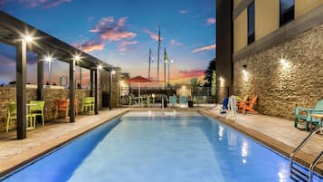 Seasonal outdoor pool, open 9 AM to 9 PM, pool loungers