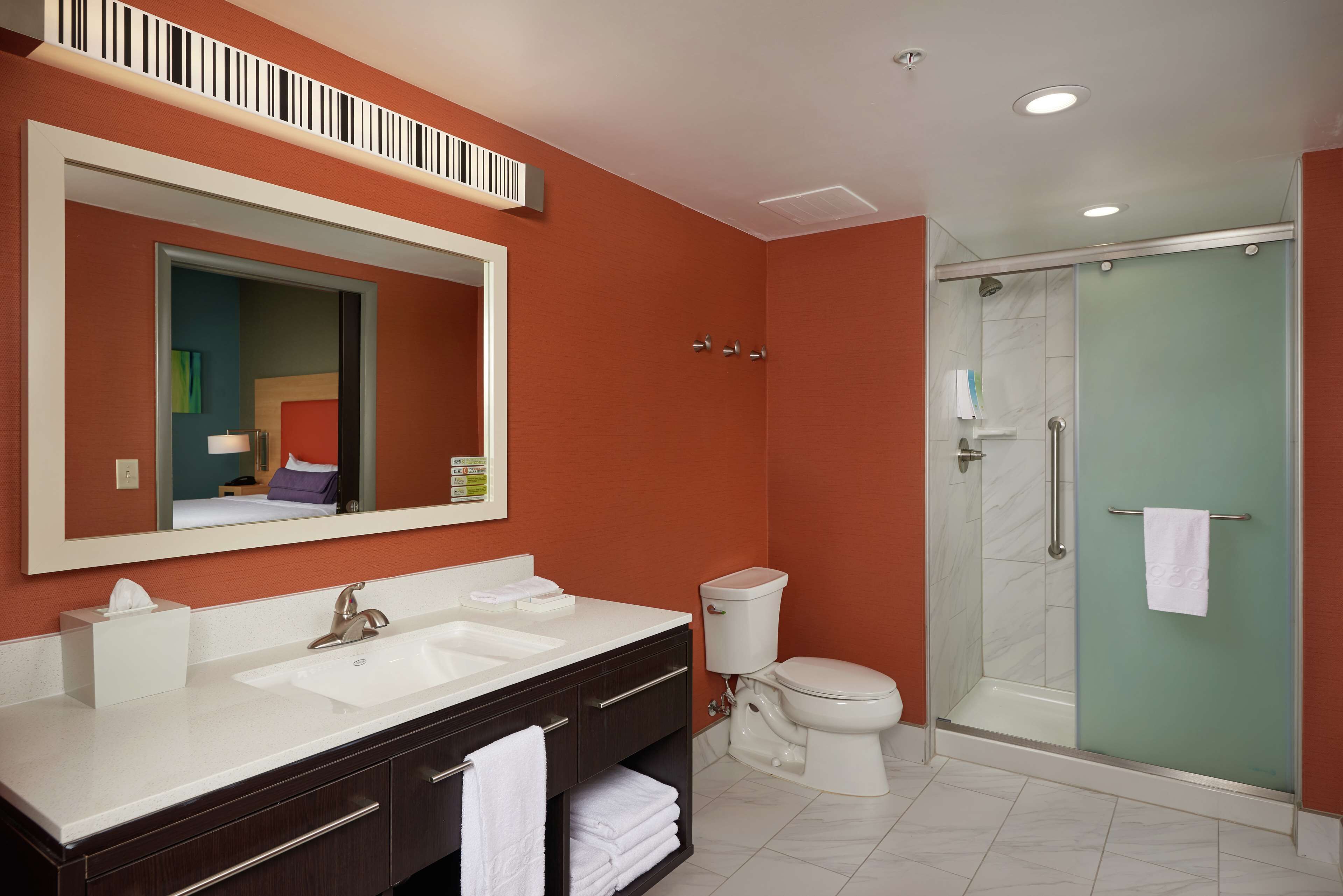 suite, 1 king bed, non smoking | bathroom | free toiletries, hair dryer, towels, soap