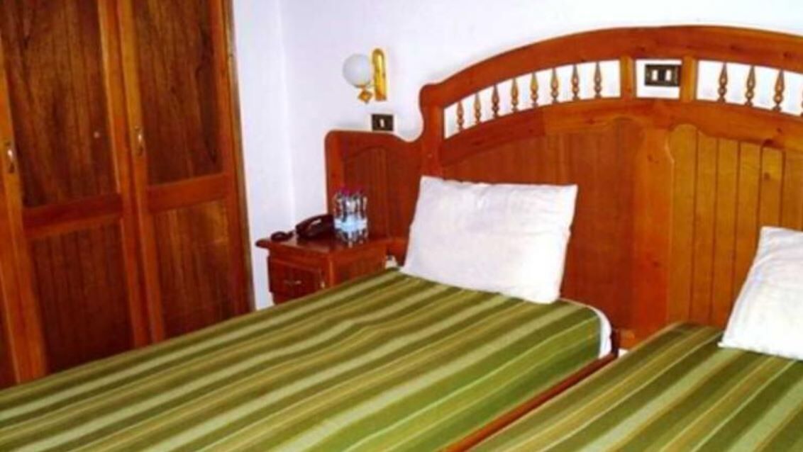 Desk, blackout drapes, WiFi (free), bed sheets
