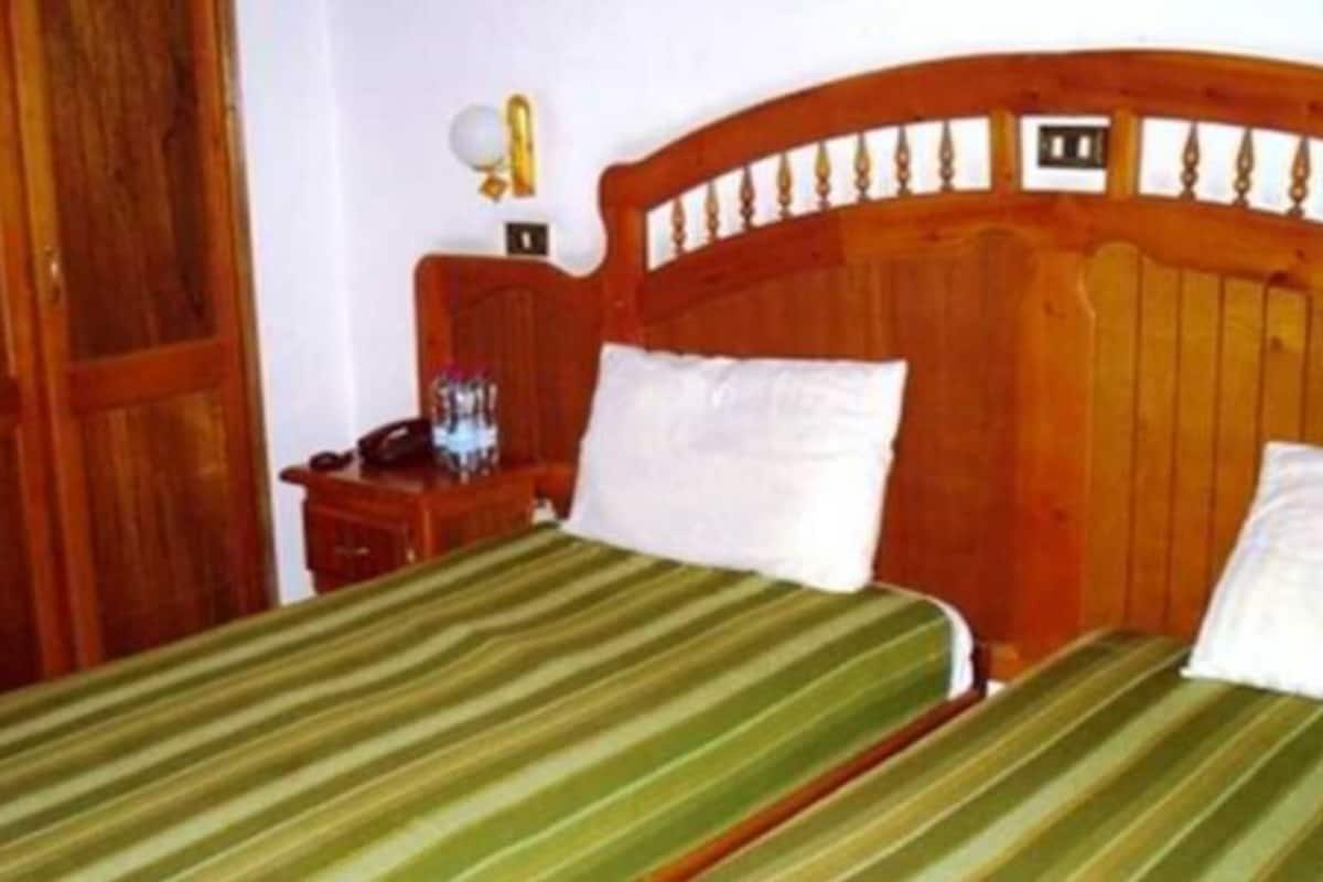 Desk, blackout drapes, WiFi (free), bed sheets