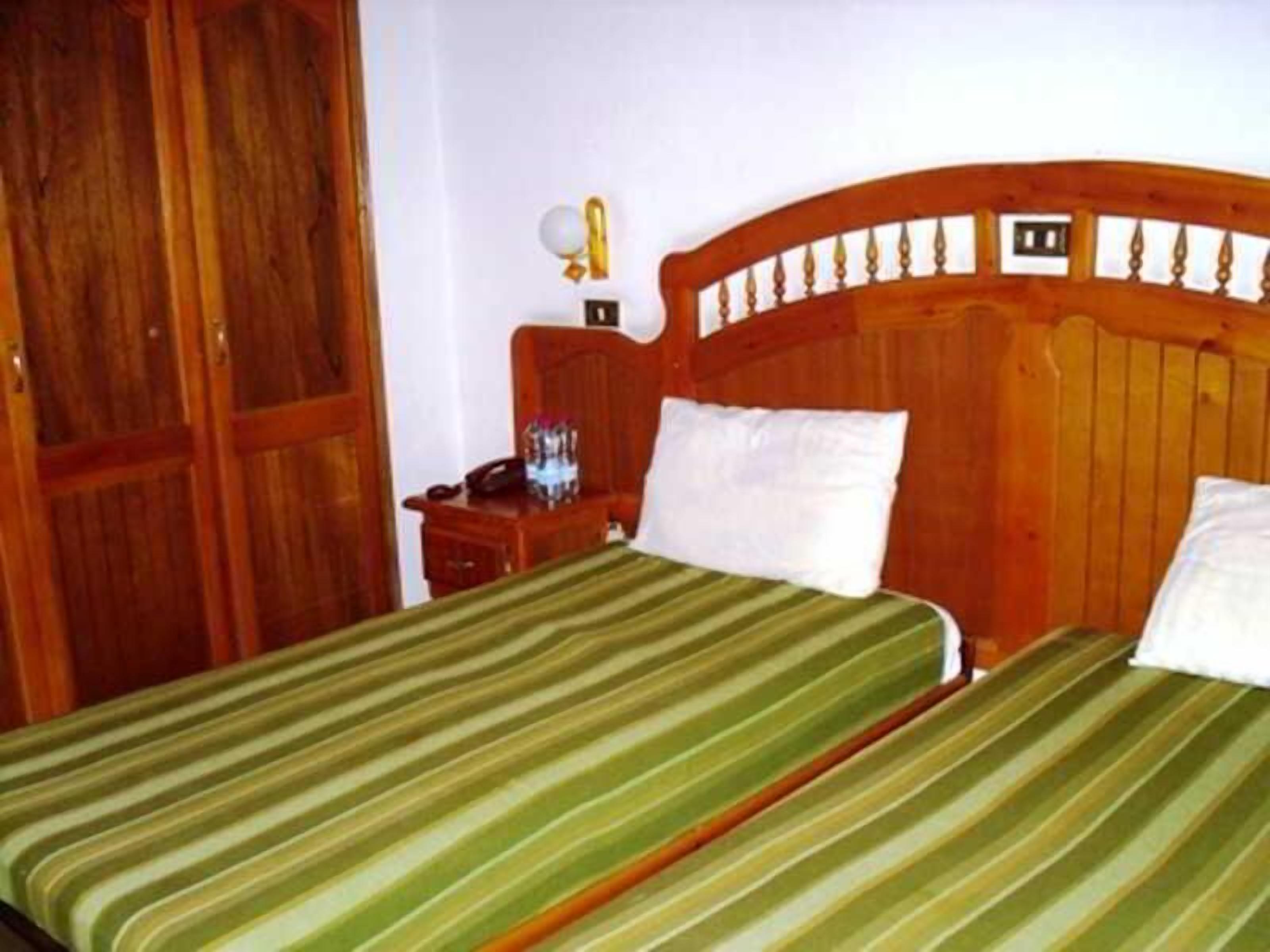 Desk, blackout drapes, WiFi (free), bed sheets