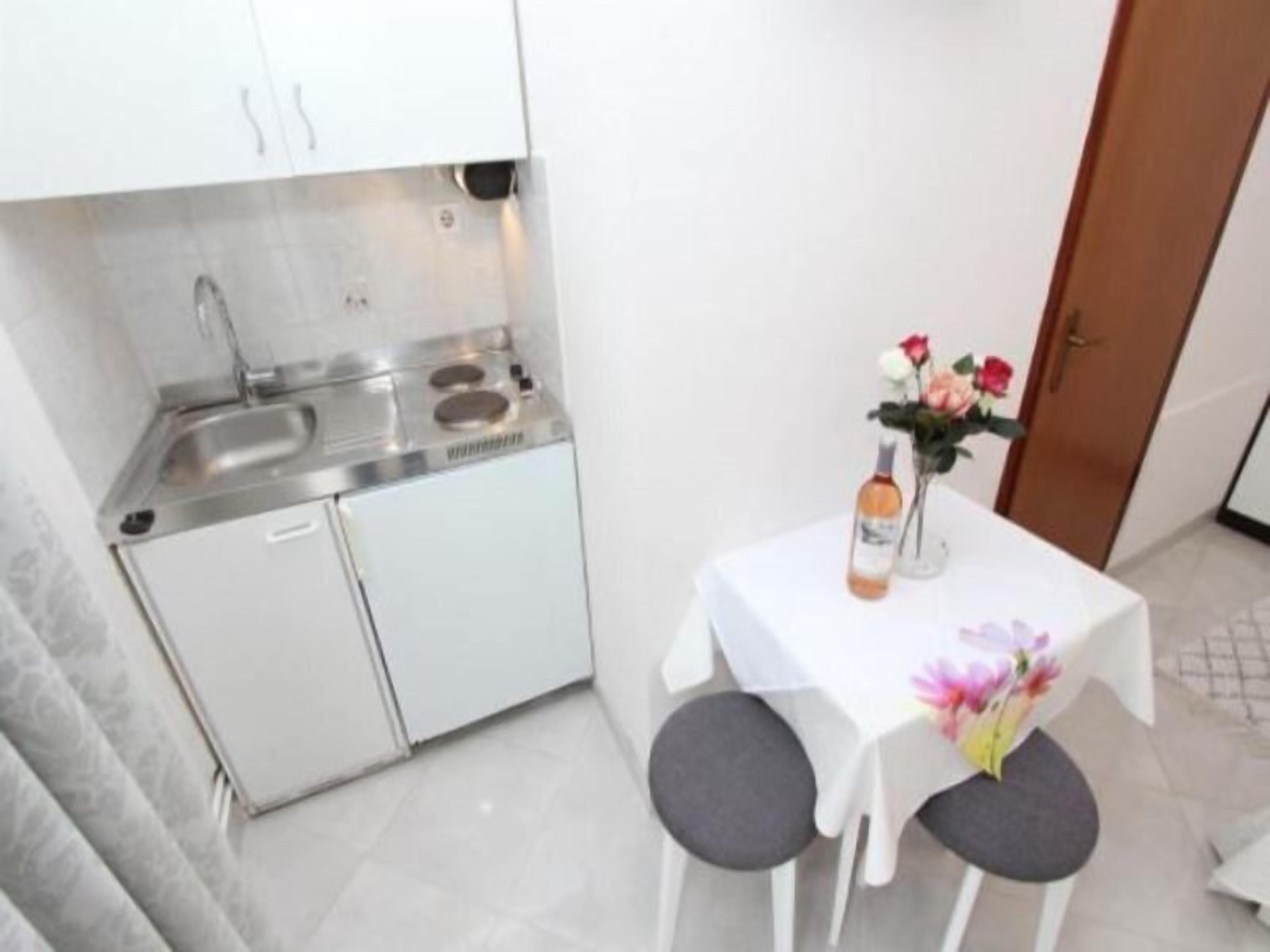 Full-sized fridge, coffee/tea maker