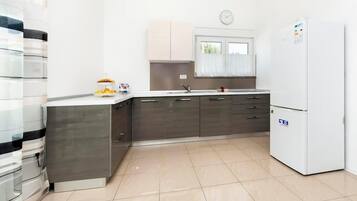 Full-sized fridge, coffee/tea maker