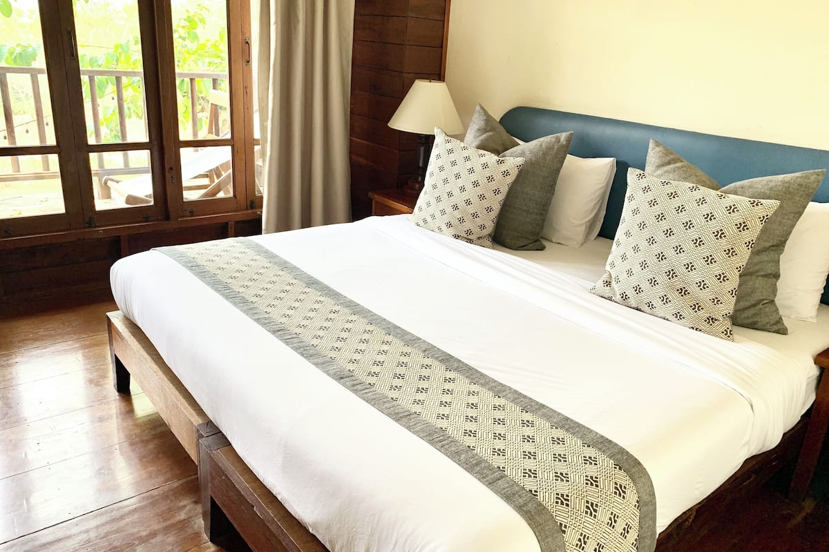 standard double room, 1 queen bed, river view | blackout curtains, free wifi, bed sheets