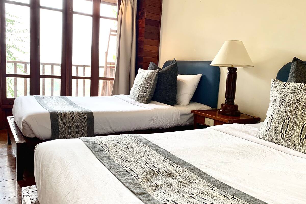 standard twin room, multiple beds, river view | blackout curtains, free wifi, bed sheets