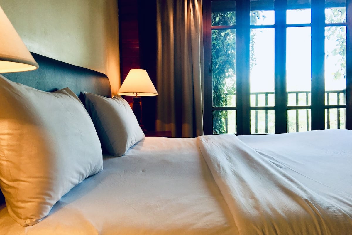 standard double room, 1 queen bed, river view | blackout curtains, free wifi, bed sheets