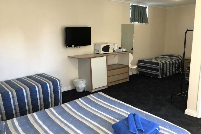 Desk, blackout drapes, iron/ironing board, free WiFi