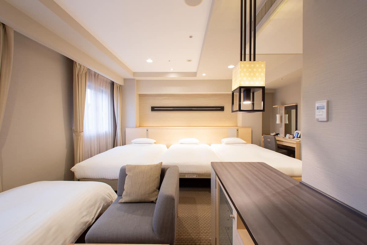 Triple Room(Sofa Bed added for 4 People) | Premium bedding, desk, laptop workspace, blackout curtains