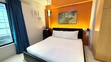 Habitación superior | Escritorio, wifi gratis, ropa de cama