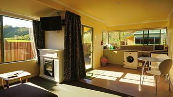 Deluxe Studio Suite, 1 King Bed, Fireplace, Mountain View (Adult Only) | Living area