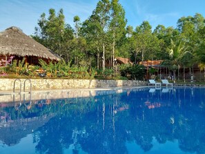 Outdoor pool, pool umbrellas, pool loungers