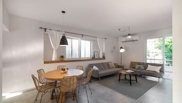 Deluxe House, 3 Bedrooms, Resort View, Courtyard Area (Kerem) | Living area | Flat-screen TV, table tennis, toys, books