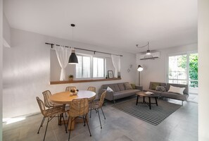 Deluxe House, 3 Bedrooms, Resort View, Courtyard Area (Kerem) | Living area | Flat-screen TV, table tennis, toys, books - Bar-On Vacation Resort - Health, Nature, Culture, Tours & Tastes in the Village (Mateh Asher)