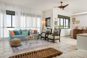 Romantic Single Room | Living room | Flat-screen TV, table tennis, toys, books - Bar-On Vacation Resort - Health, Nature, Culture, Tours & Tastes in the Village (Mateh Asher)