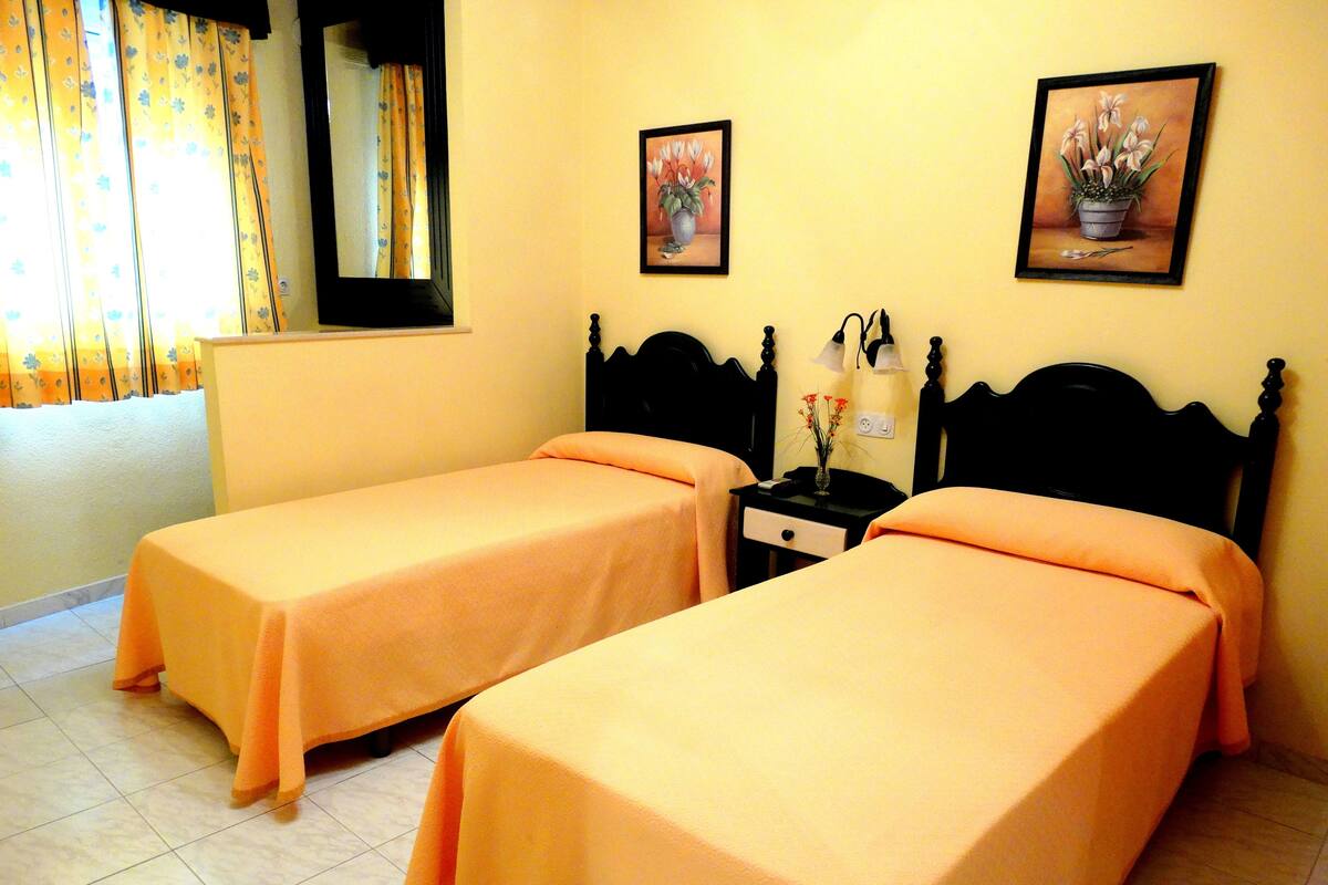 Blackout curtains, free cots/infant beds, free WiFi, bed sheets