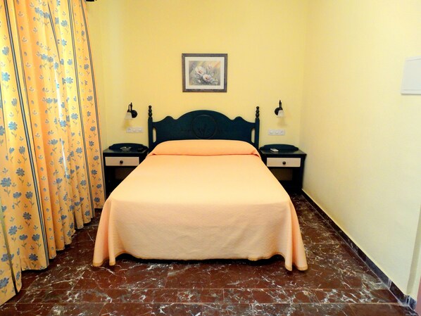 Blackout curtains, free cots/infant beds, free WiFi, bed sheets