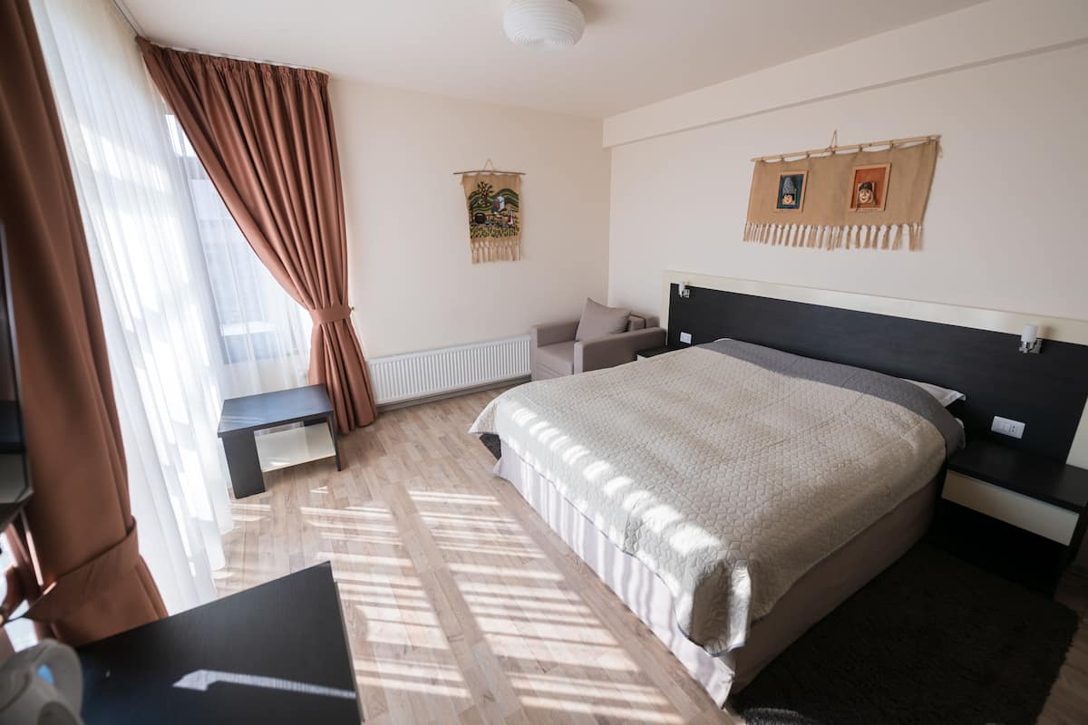 Premium bedding, down comforters, pillowtop beds, minibar
