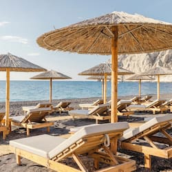 On the beach, sun-loungers, beach umbrellas, beach towels