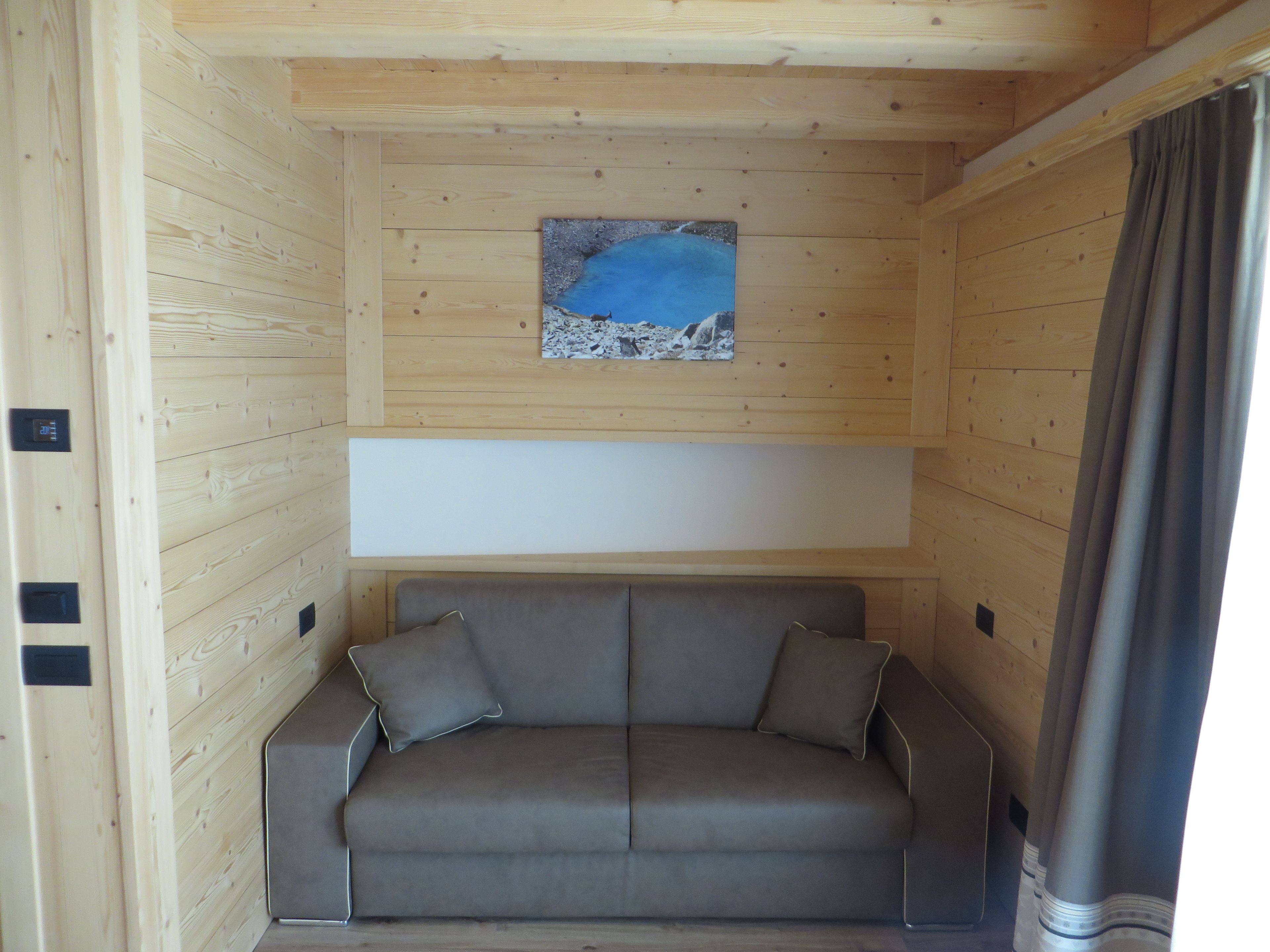 junior suite, balcony | living area | flat-screen tv, heated floors