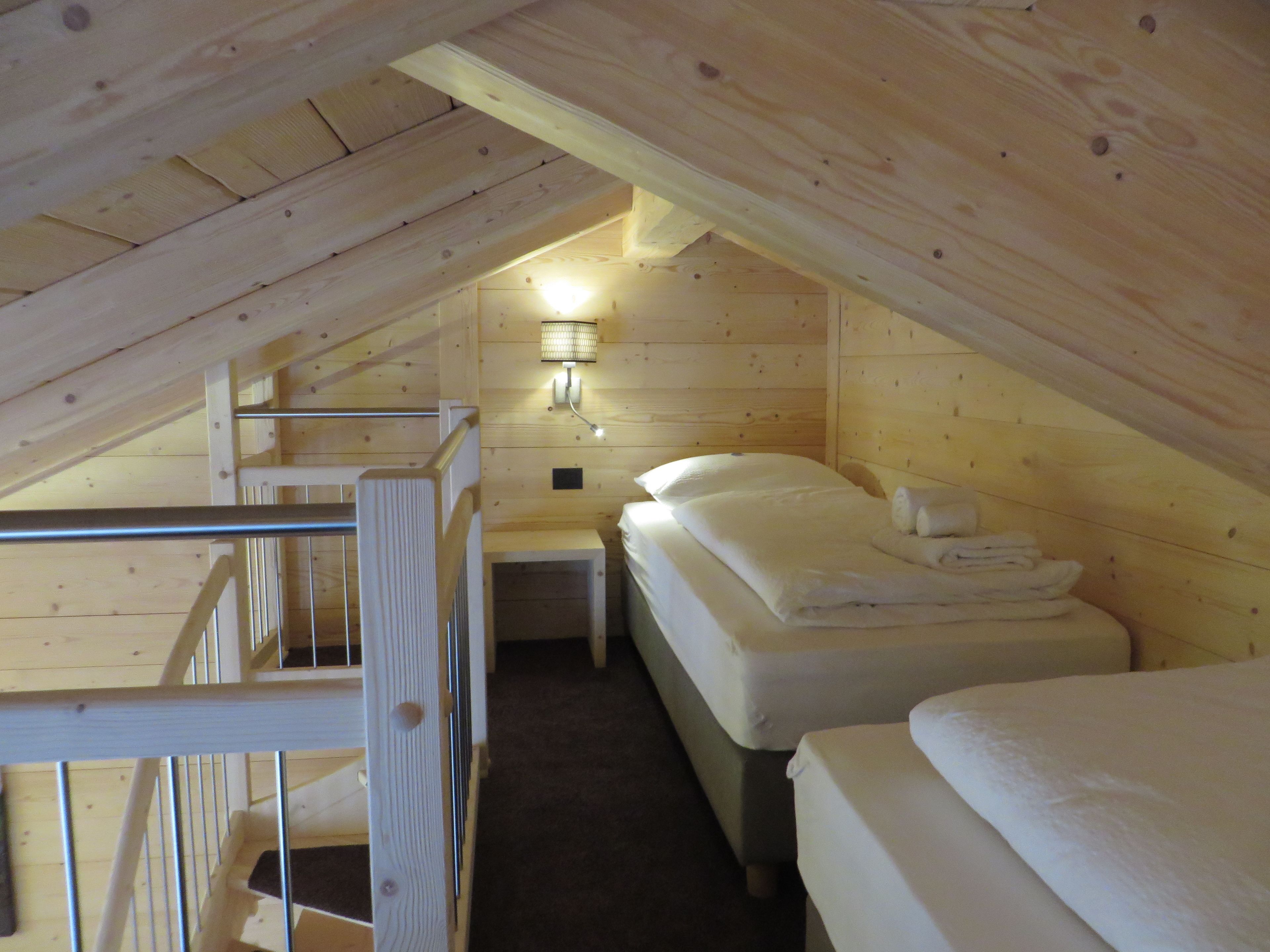 family room, mountain view | premium bedding, down duvets, in-room safe, desk