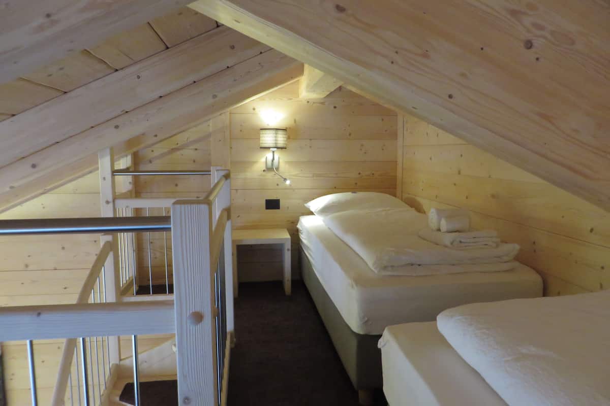 family room, mountain view | premium bedding, down duvets, in-room safe, desk