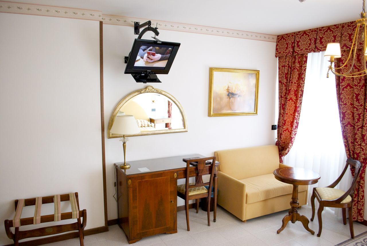 classic room, sea view | living area | flat-screen tv