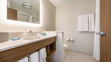 Hydromassage showerhead, designer toiletries, hair dryer, towels