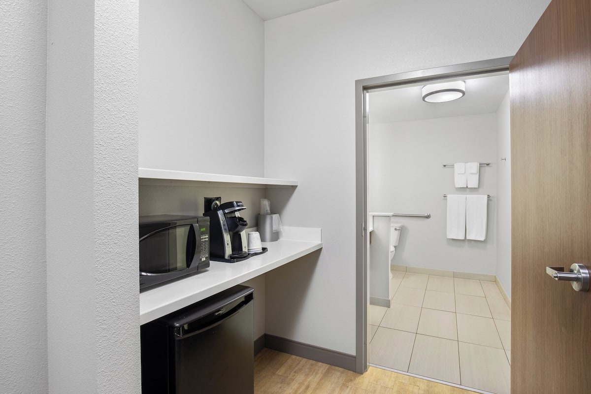 Suite, 1 King Bed, Accessible (Communications) | In-room safe, desk, blackout drapes, iron/ironing board