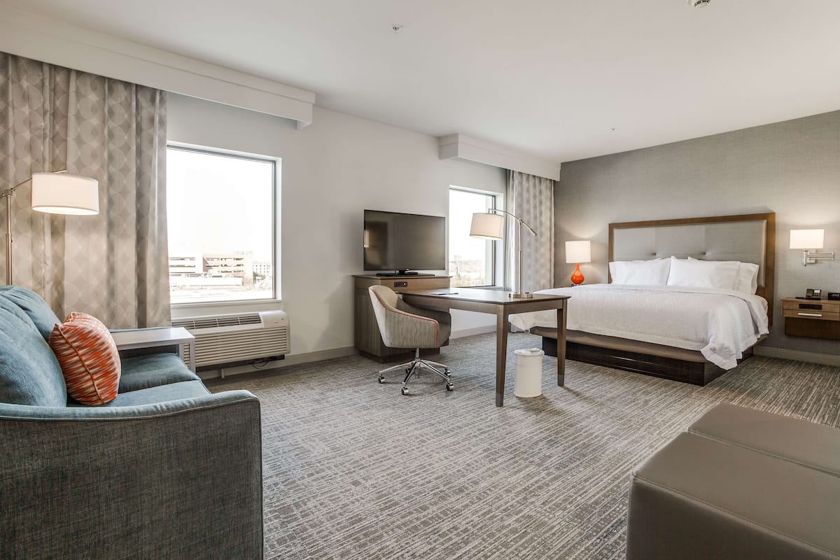 premium bedding, desk, blackout curtains, iron/ironing board