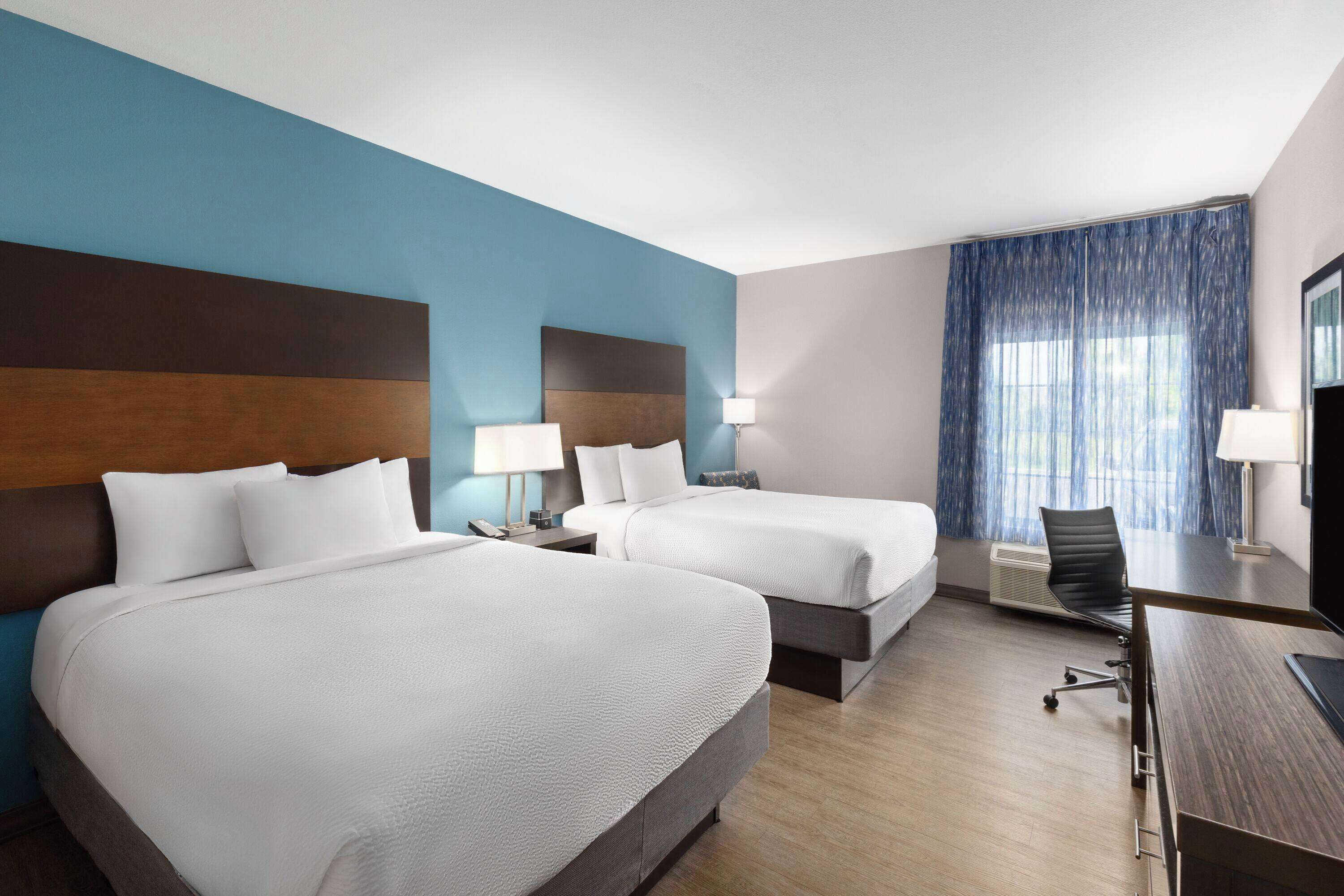 premium bedding, pillow-top beds, desk, soundproofing