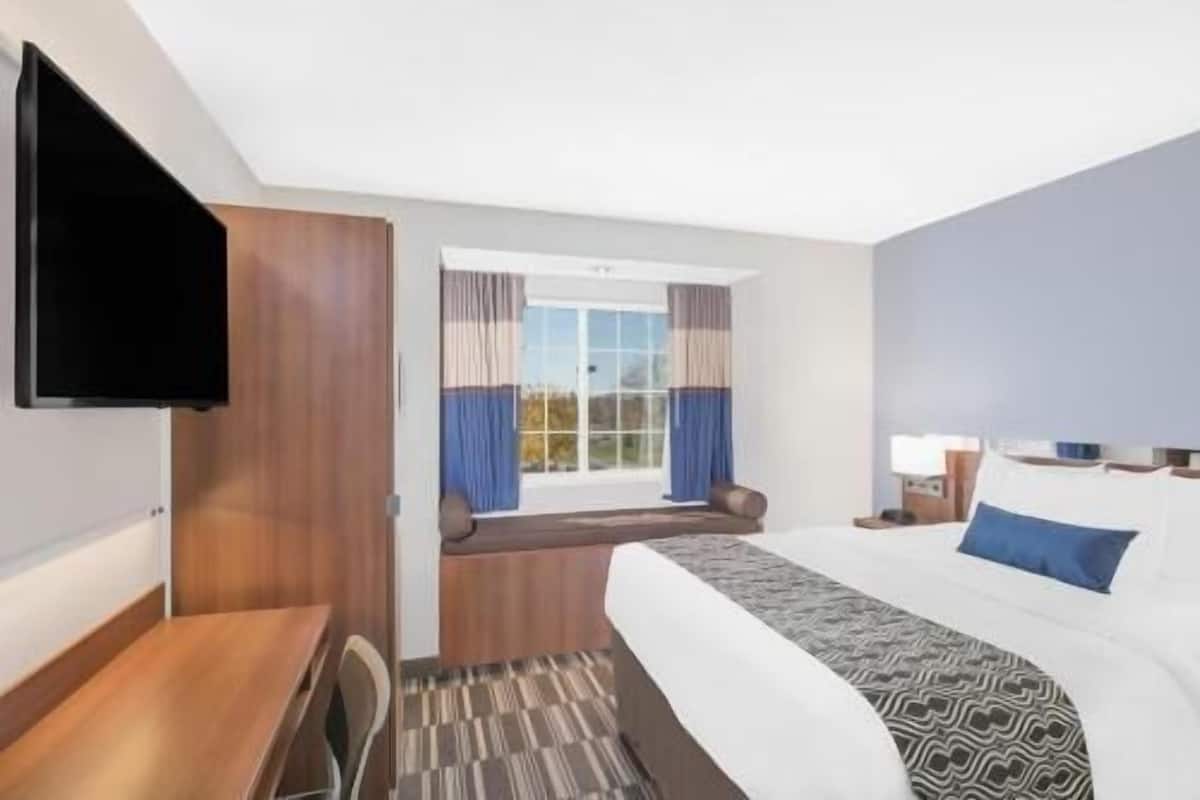 Desk, iron/ironing board, WiFi (free), alarm clocks