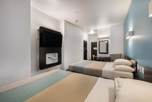 Cortinas blackout, wifi gratis y ropa de cama 