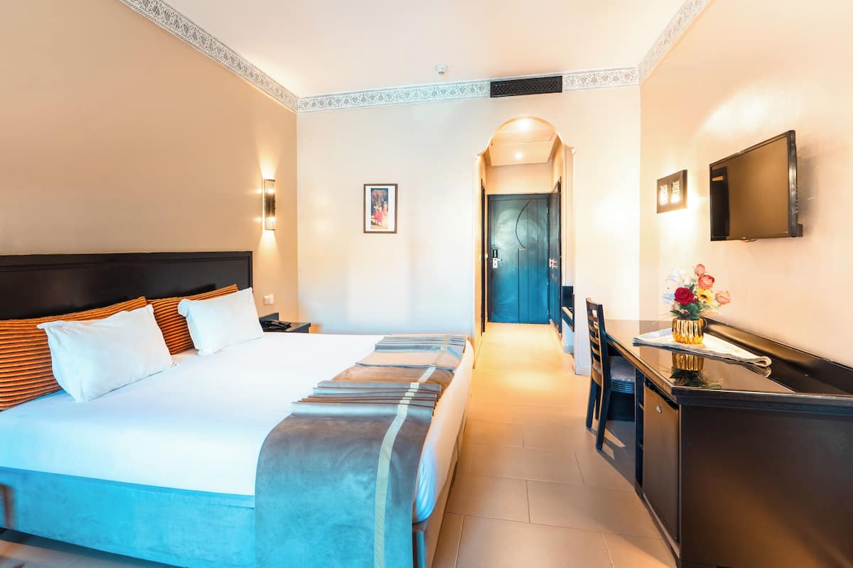 Double Room, Garden View | Premium bedding, minibar, in-room safe, individually decorated