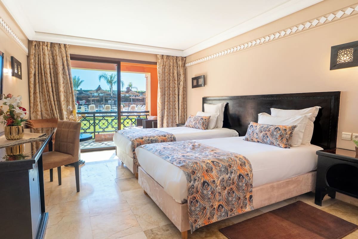 Double Room, Pool View | Premium bedding, minibar, in-room safe, individually decorated