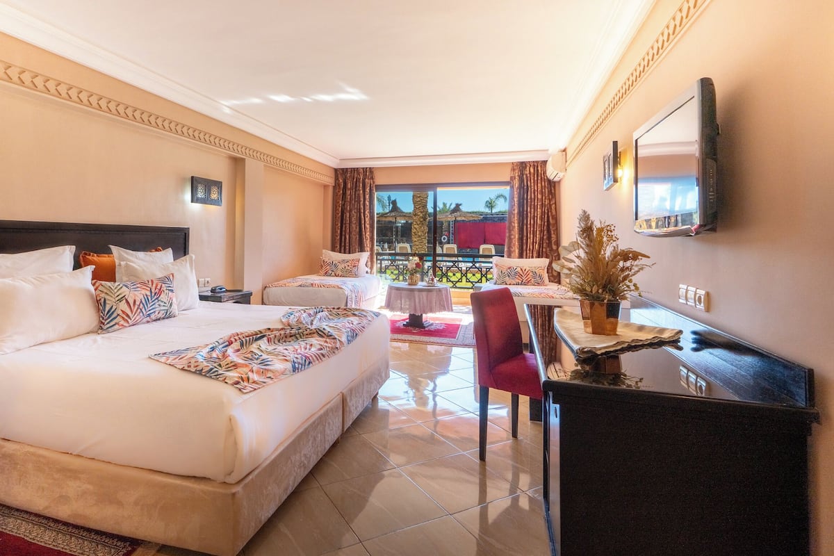 Family Room | Premium bedding, minibar, in-room safe, individually decorated