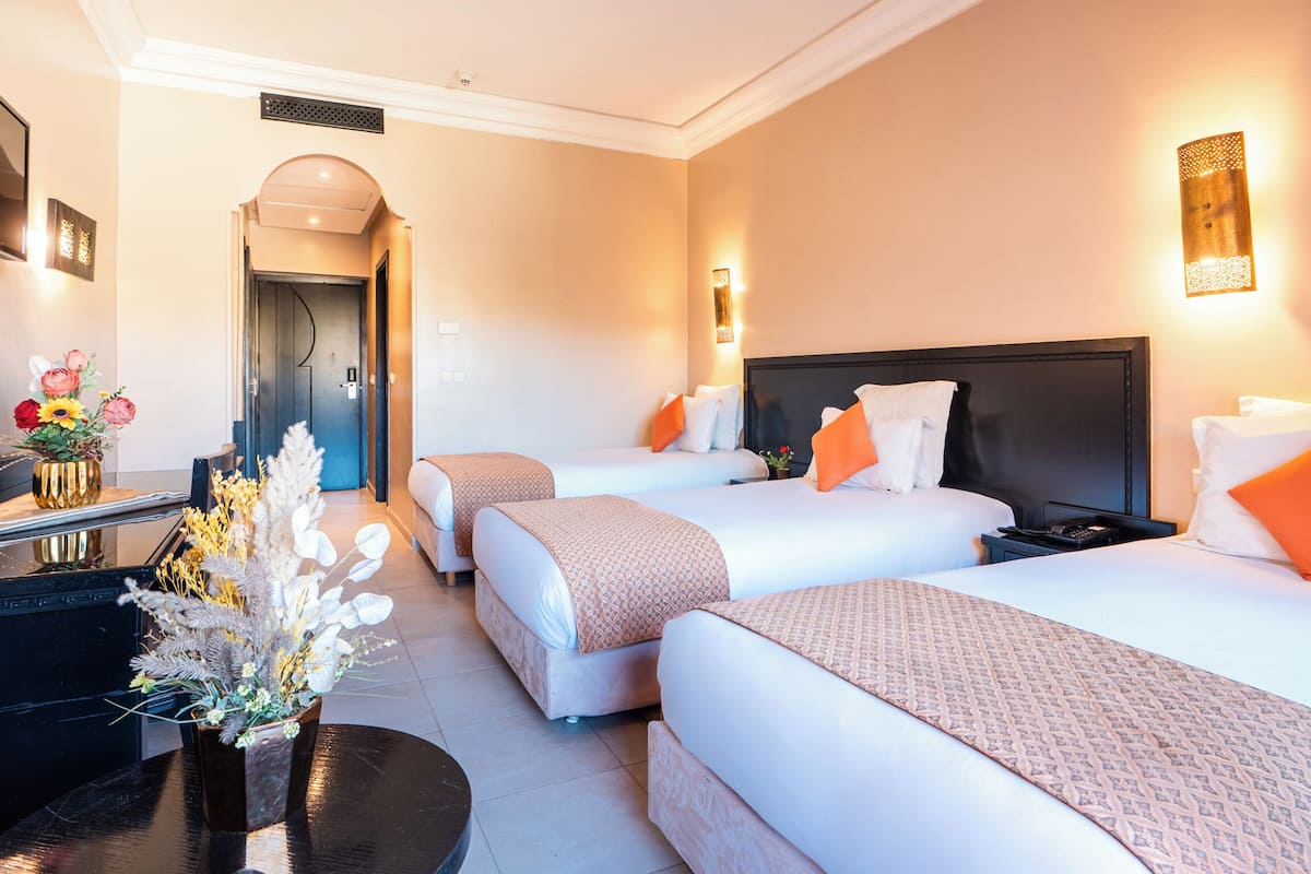 Triple Room | Premium bedding, minibar, in-room safe, individually decorated