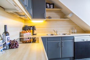 Apartamento Deluxe (Vierwegen) | Cocina privada | Cafetera o tetera y hervidor eléctrico