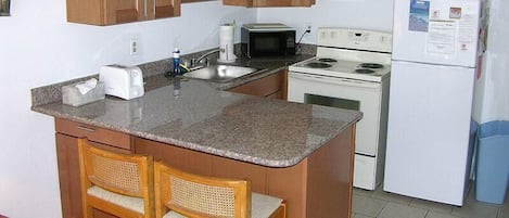 Condo, 1 Bedroom | Private kitchen | Full-size fridge, microwave, oven, stovetop