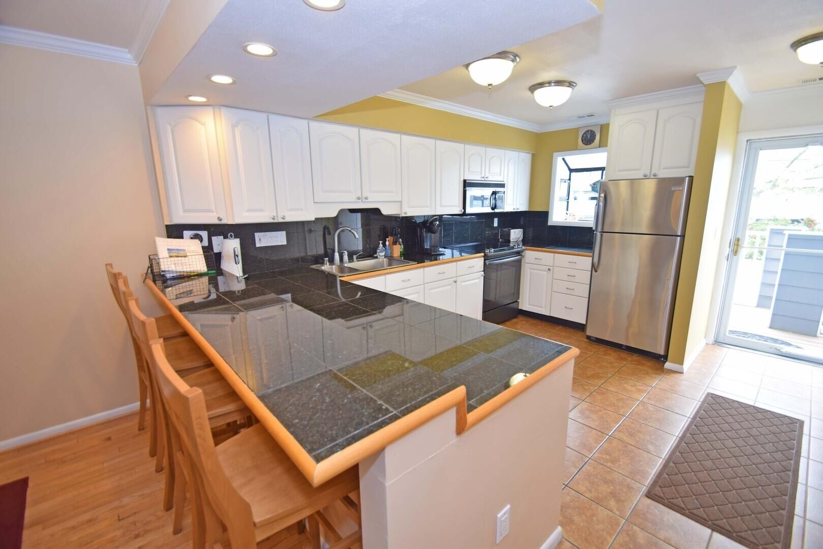 Townhome, 2 Bedrooms | Private kitchen | Fridge, microwave, dishwasher