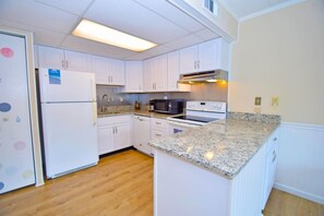 Condo, 1 Bedroom | Private kitchen | Full-size fridge, microwave, stovetop, dishwasher