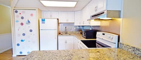 Condo, 1 Bedroom | Private kitchen | Full-size fridge, microwave, stovetop, dishwasher
