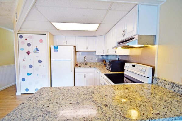 Condo, 1 Bedroom | Private kitchen | Full-sized fridge, microwave, stovetop, dishwasher