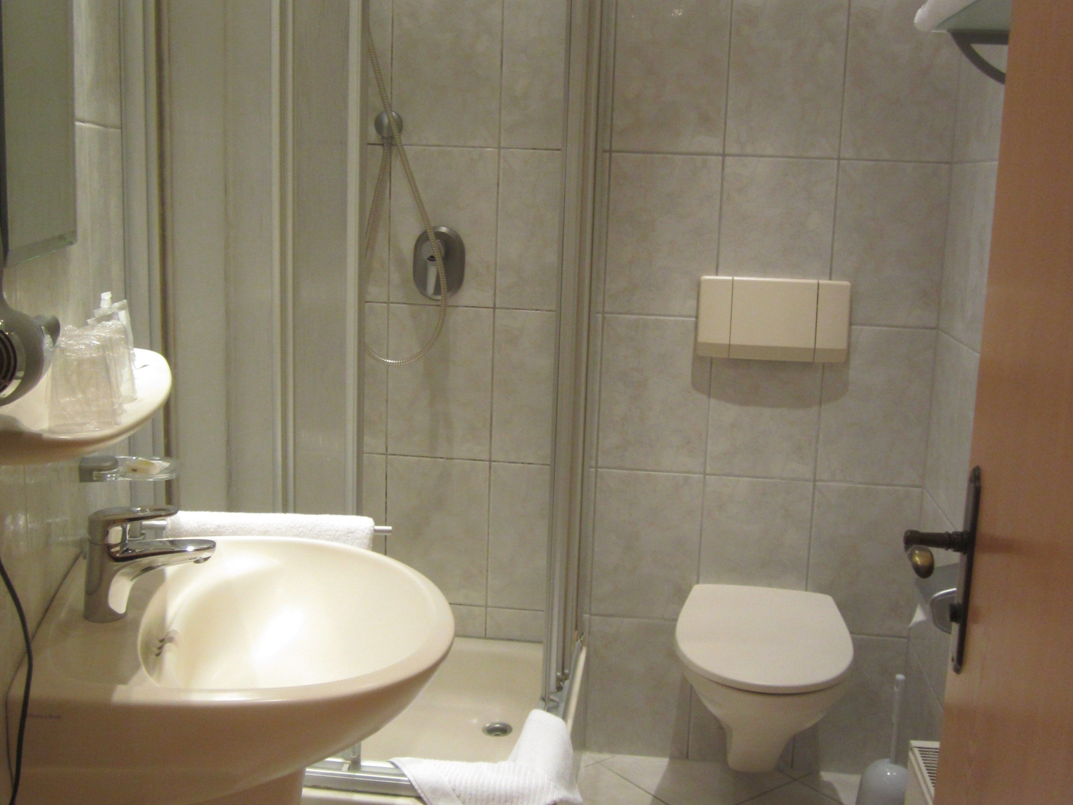 Shower, free toiletries, hair dryer, towels