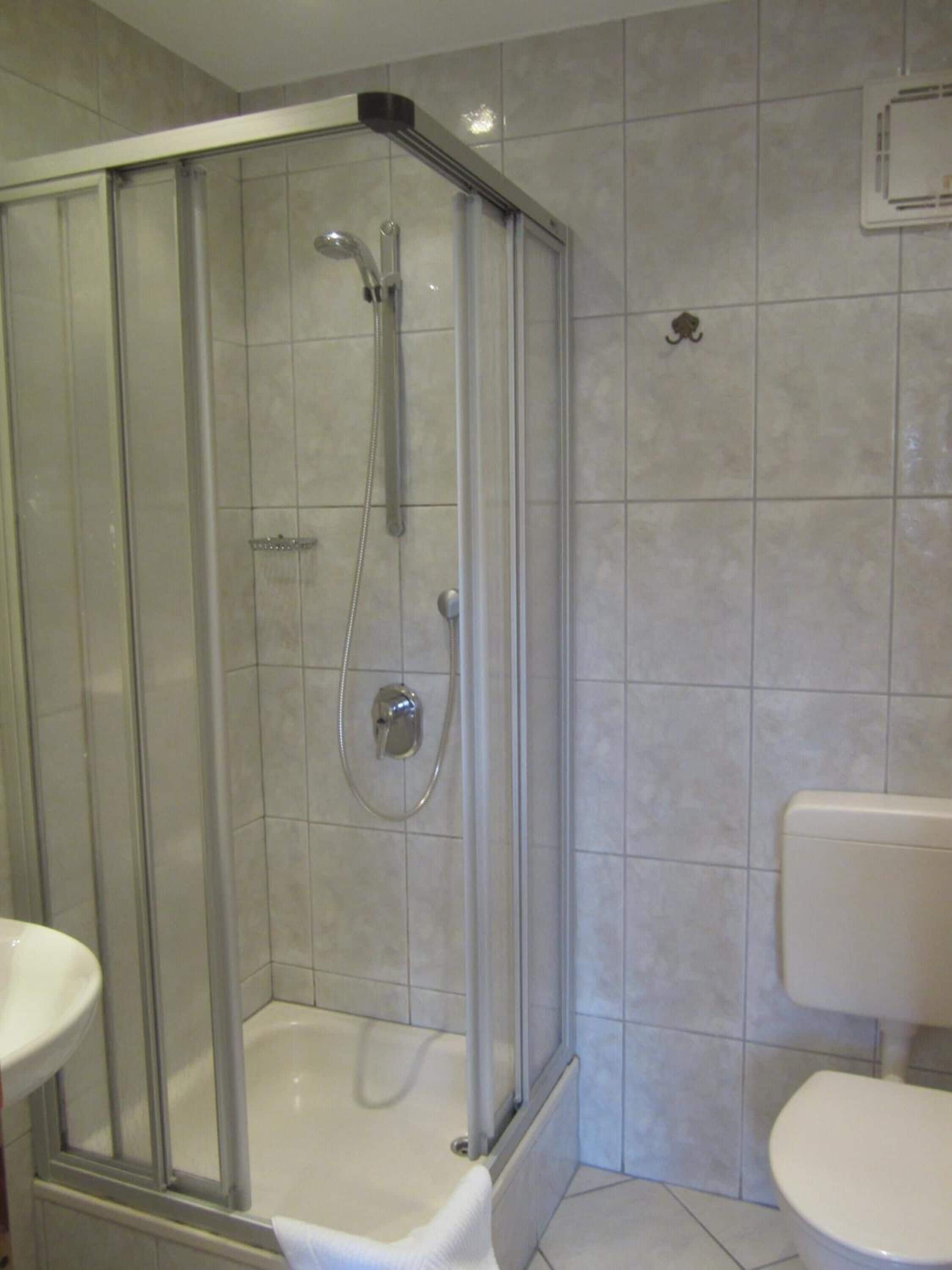 Shower, free toiletries, hair dryer, towels